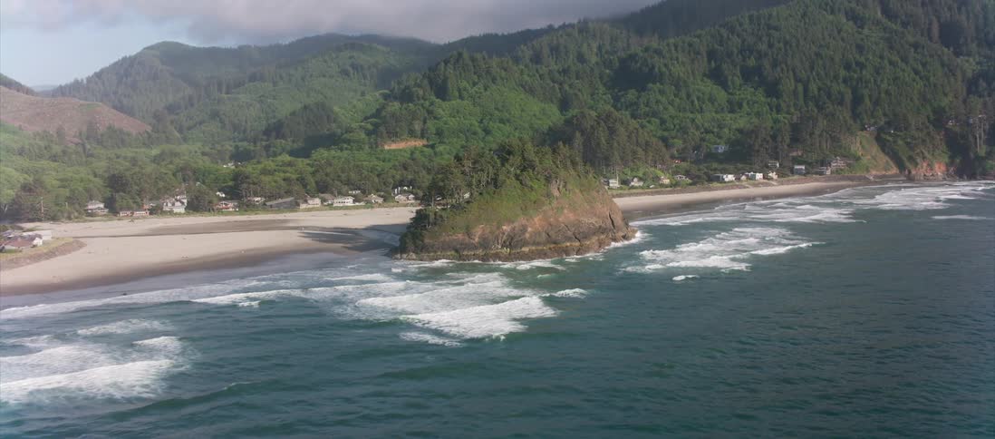 Skyline view of water beach and houses