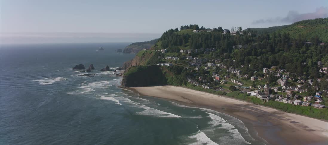 Skyline view of water beach and neighborhood