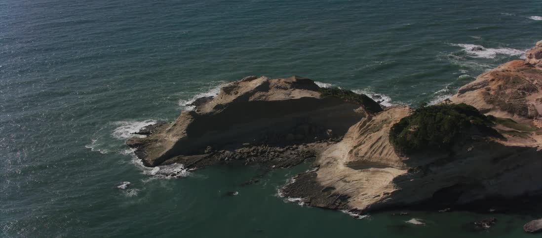 A small peninsula juts into the ocean