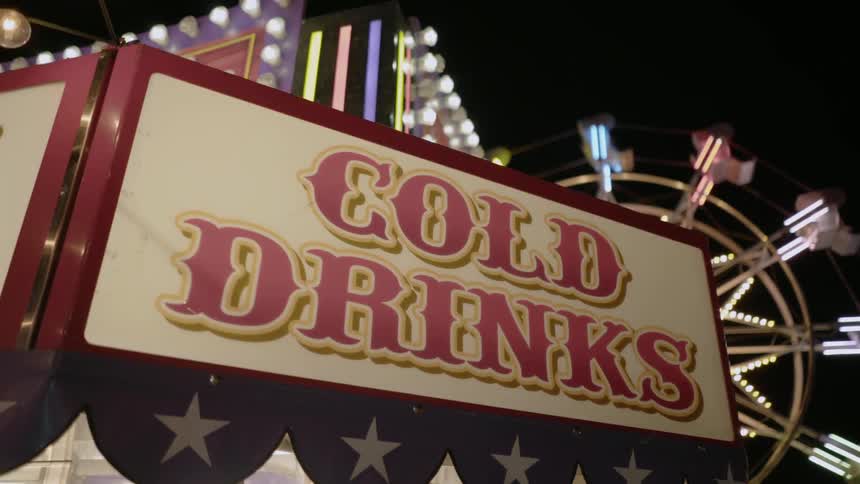 Circus signage with lights advertising cold drinks