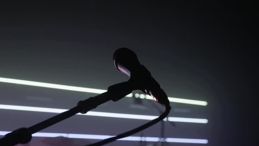 A microphone in a dark room