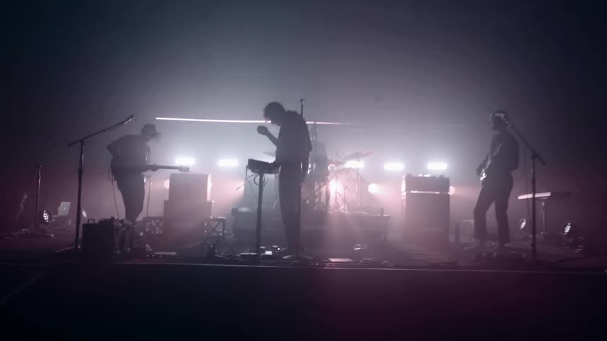 A band plays music on a stage