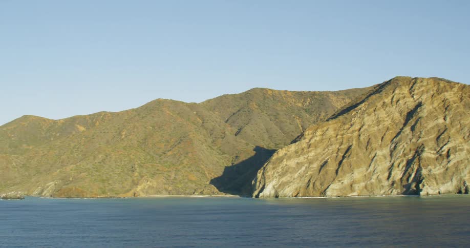 A mountain range lies along a coast