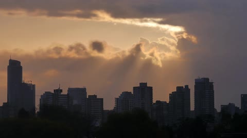 A city skyline at dawn