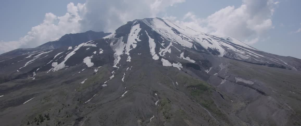 Aerial view of a mountain covered in snow