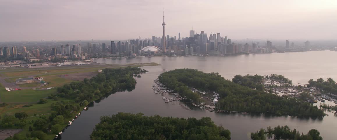 A city sits next to a body of water
