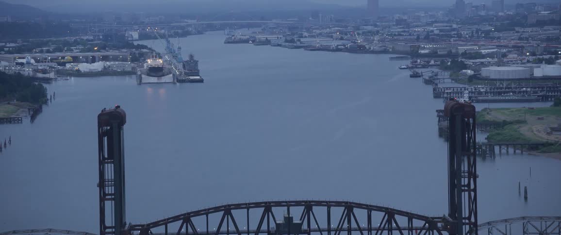 An aerial shot of a city on a river