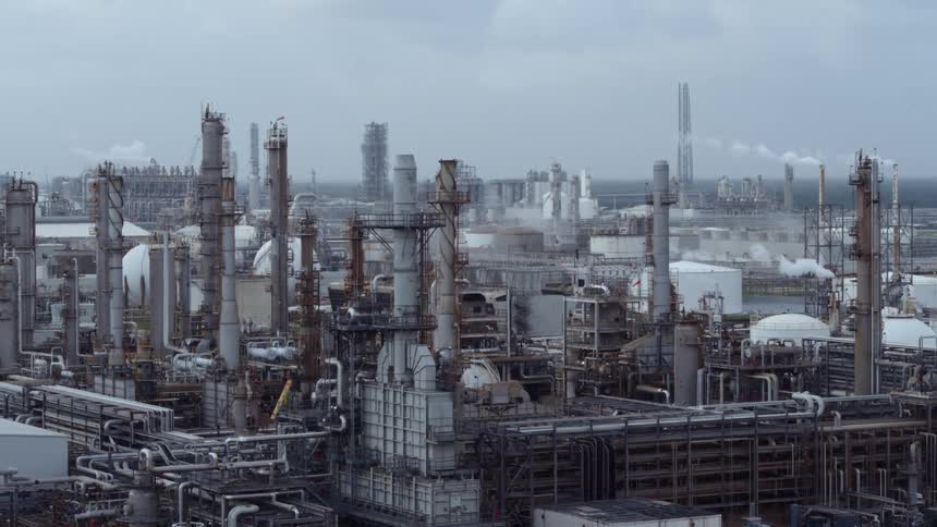 A dense industrial area on a cloudy day