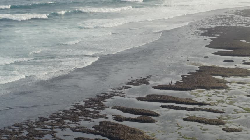 A rocky beach during the day