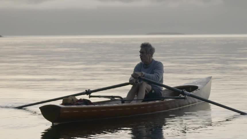 A man rows a boat