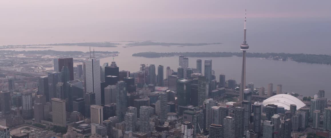 A city sits by a large bay