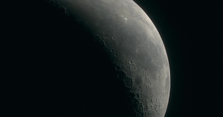 The camera focuses on a close up of the Moon
