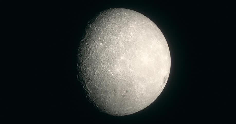 The camera looks at an almost full Moon