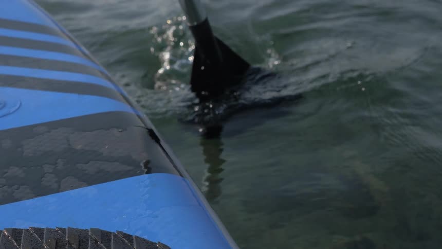 A person is canoeing in the lake