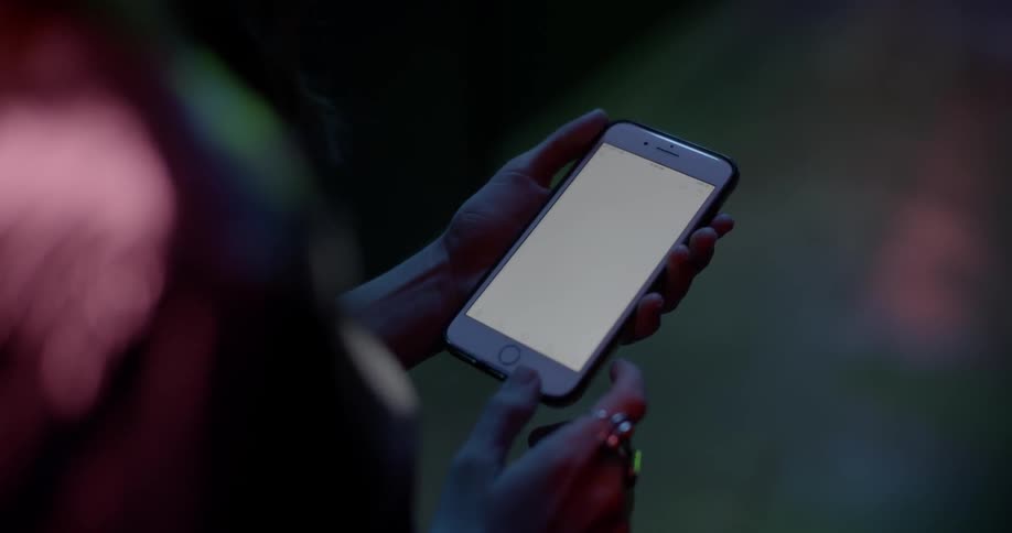 Girl playing on a cell phone