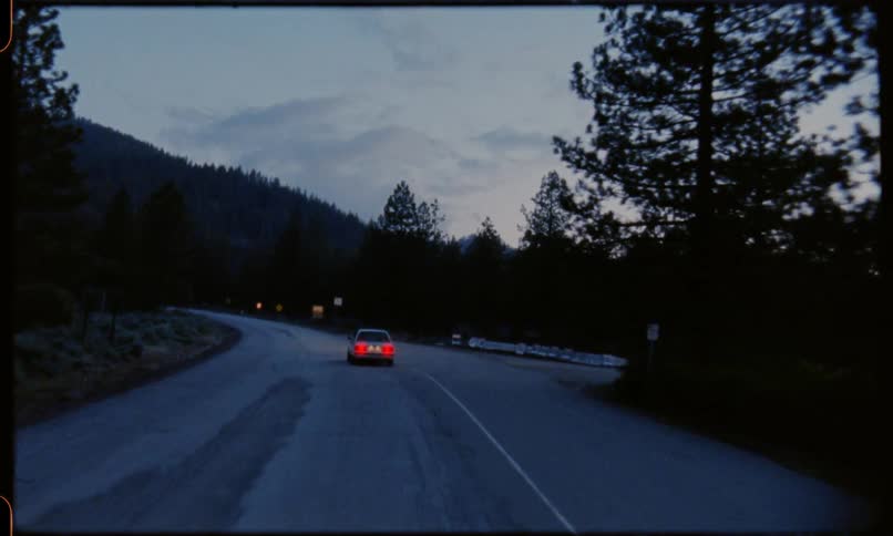 Car traveling along a mountain road