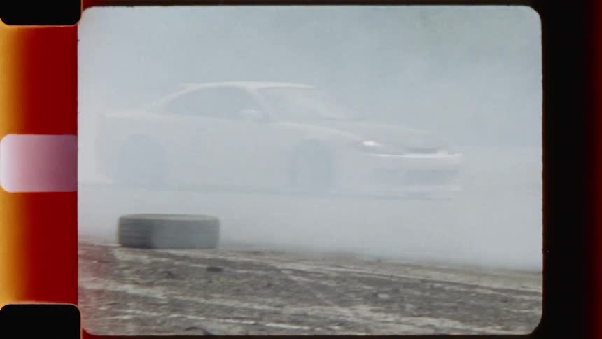 Race cars drifting on a race track