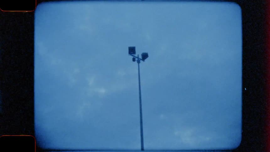 Parking lot lights loom into the sky