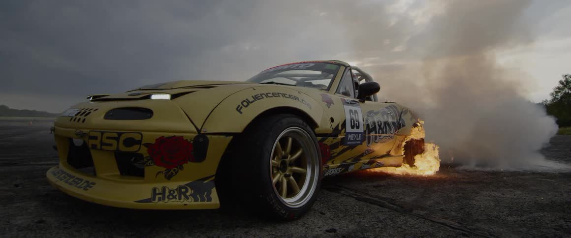 A race cars tire burning