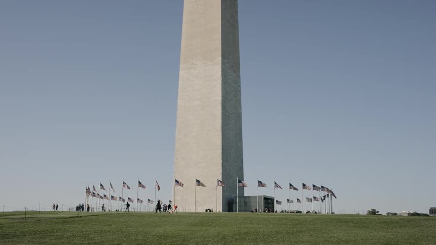 American flags encircle the washington monument