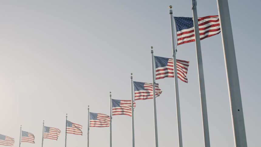 Us flags wave in the wind