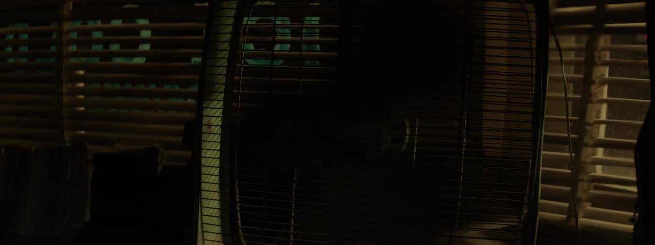 Wind blowing a box fan and blinds while lights go on and off