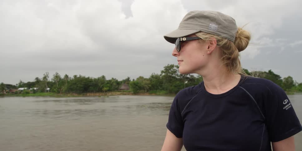 Woman looks out over the water