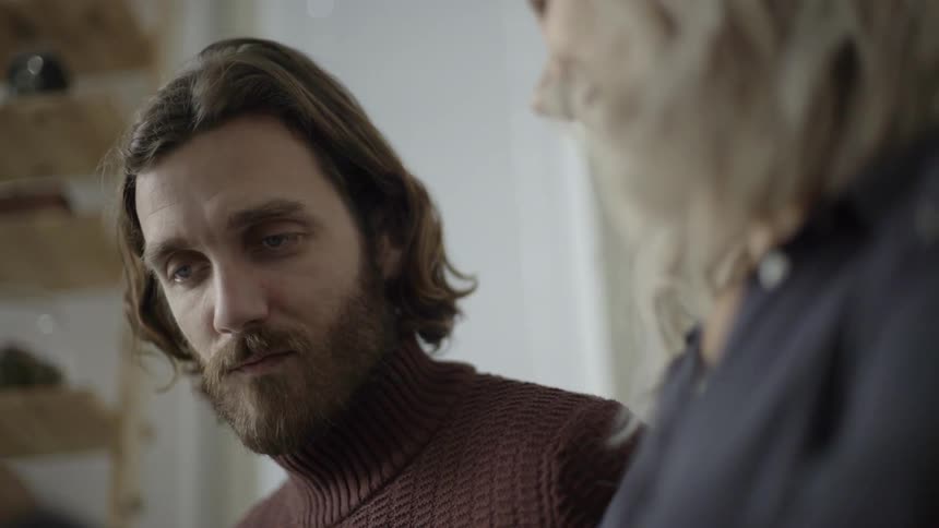 A man and woman discussing something