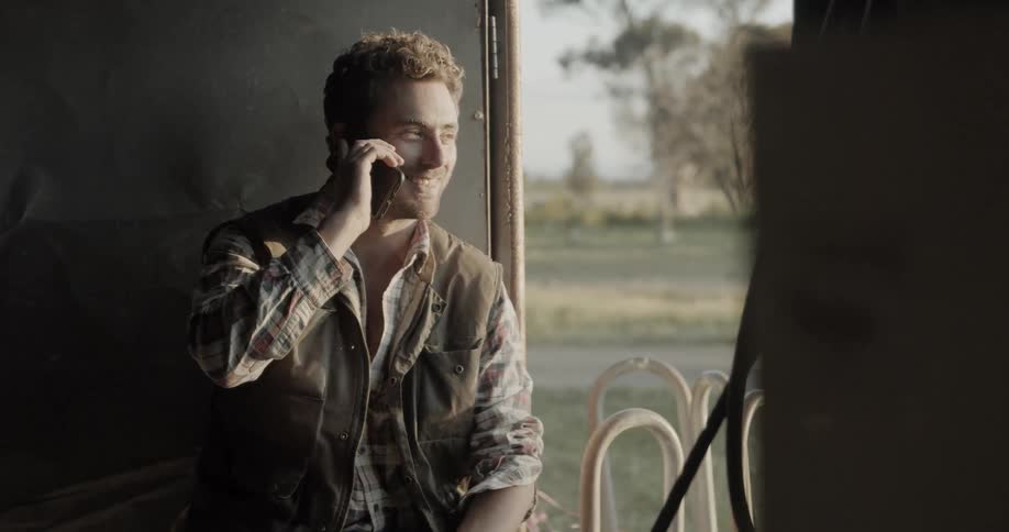A man makes a call on a mobile phone