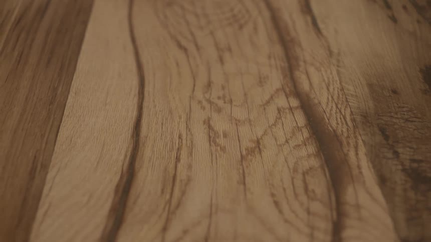 A piece of wood that is the top of a table