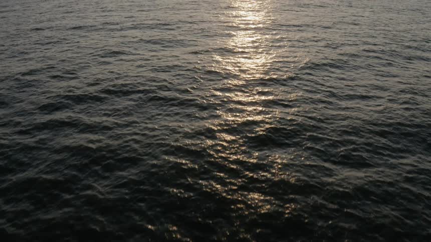 Houses along the ocean coast during sunrise