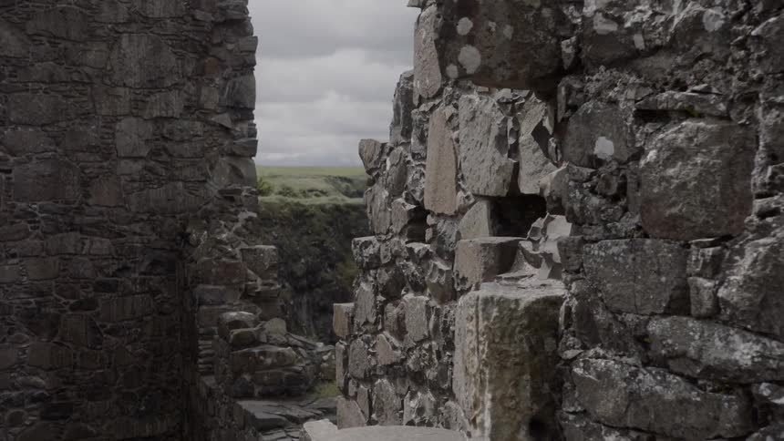 A rocky abandoned fort with the sky in the background