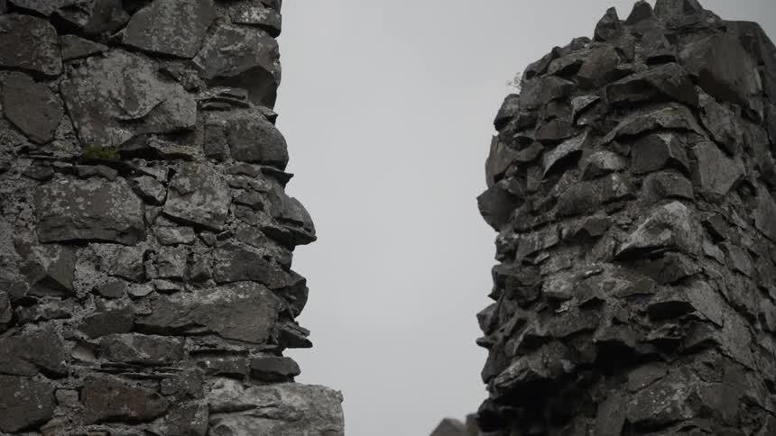 Two rocky pillars with the sky in the background