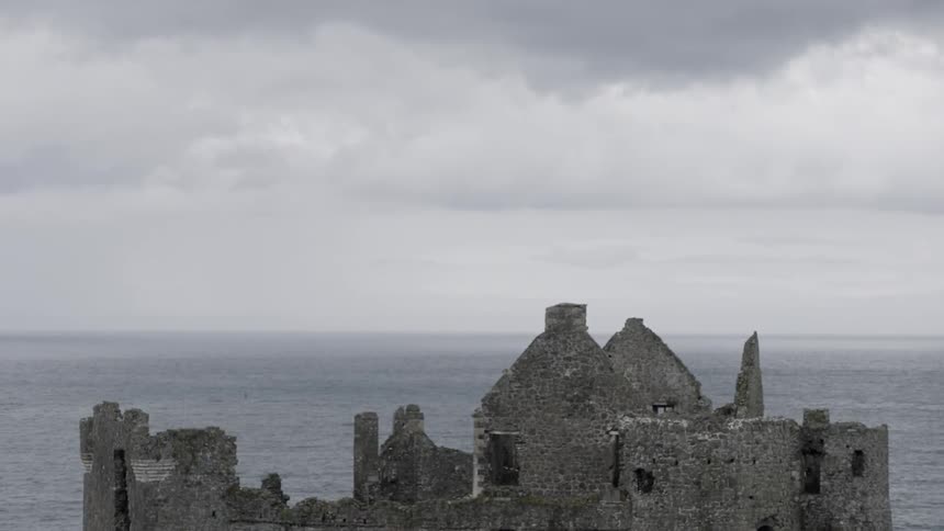 Building ruins sitting on a coast