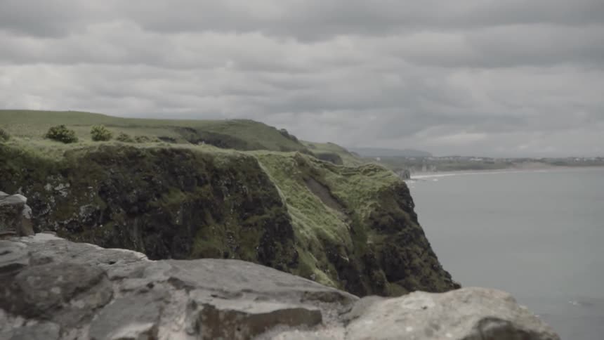 The partially standing walls of an ancient monument on the coast