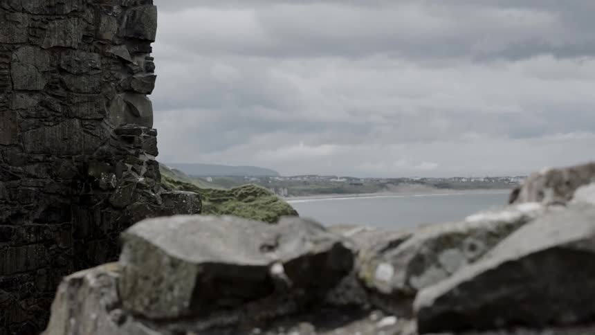 Stone building near sea rocks