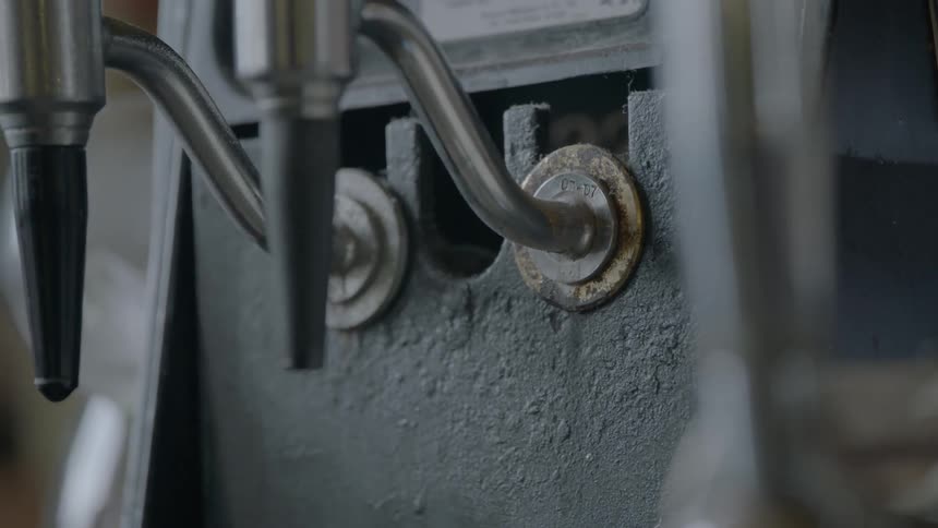 A lamp fixture embedded in a metal bracket