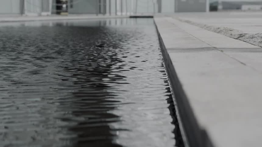 Water ripples in an empty pool