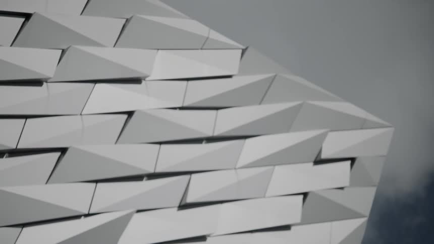 An abstract sculpture with the sky in the background