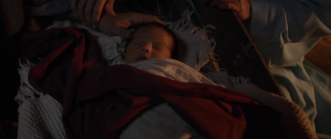 Baby sleepsin cradle