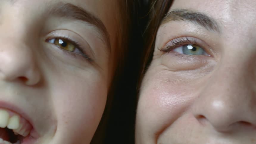 Woman and girl laugh