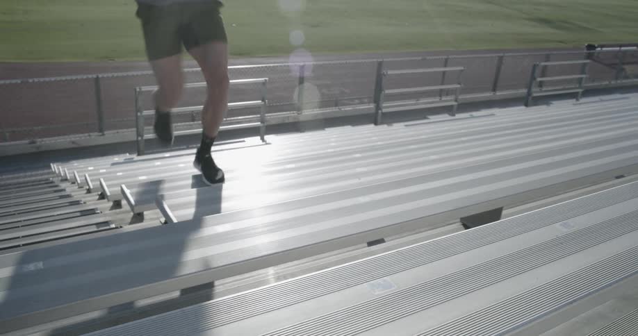 Man races up stadium seats