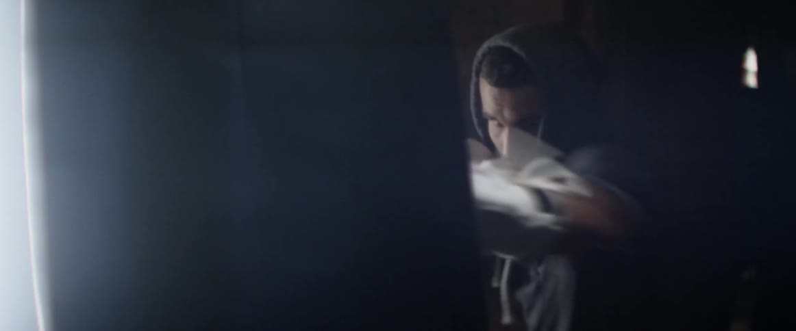 A person punching a punching bag