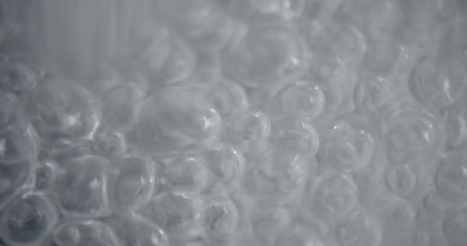The water is bubbling as it splashes down