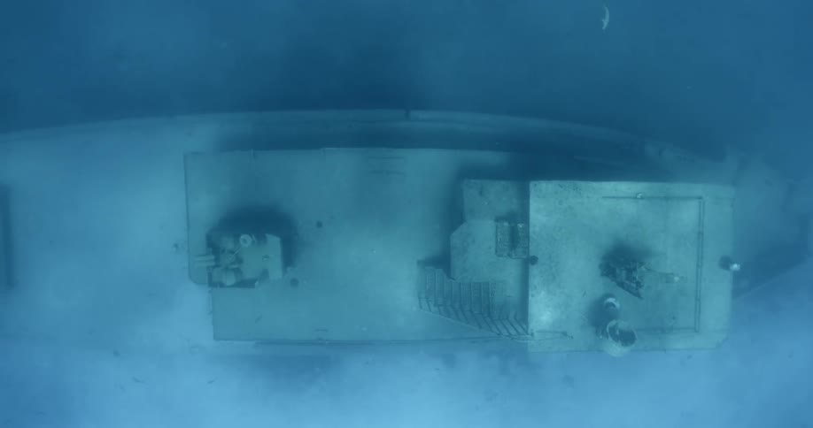 The boat is in the sand at the bottom of the water