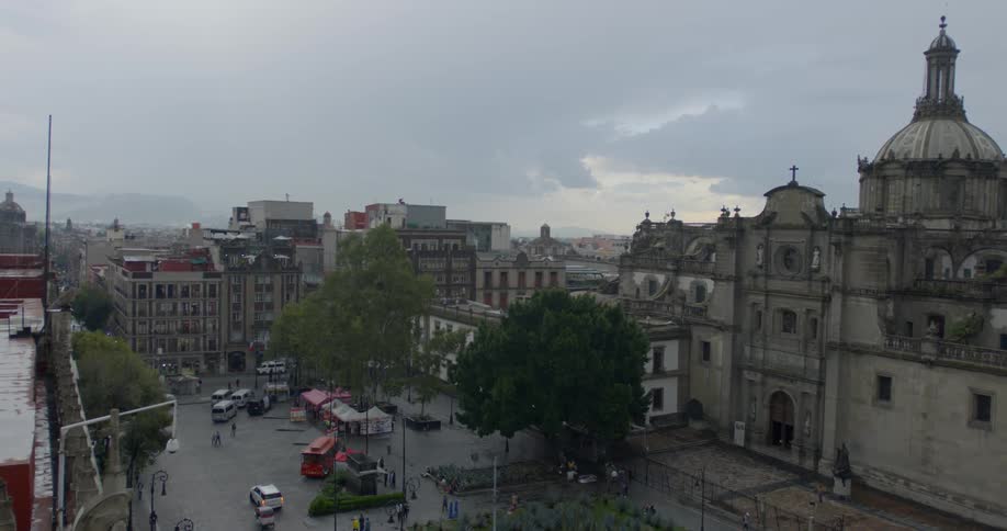 A city with older architecture and grey skies