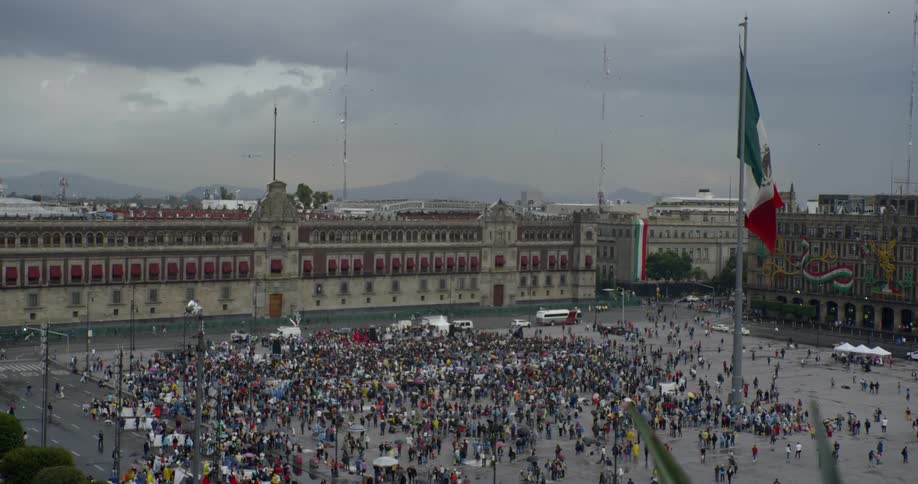 A rally stands outside a government building in mexico