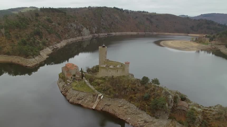 Castle and keep on peninsula in river
