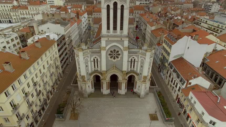 The church is in the center of the buildings