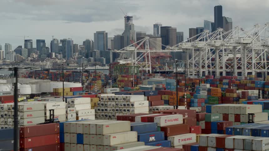 Thousands of shipping containers on the port of a large city